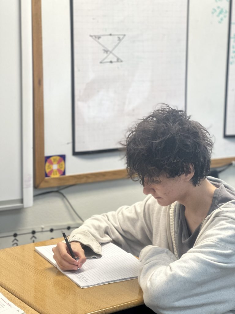 A student working on math.